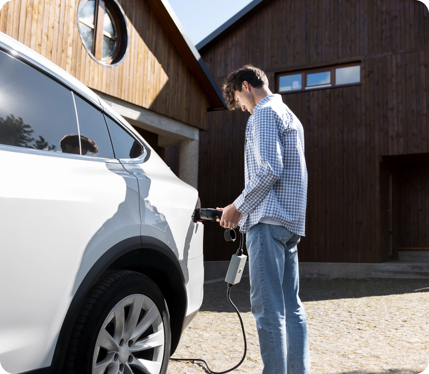person taking care electric car