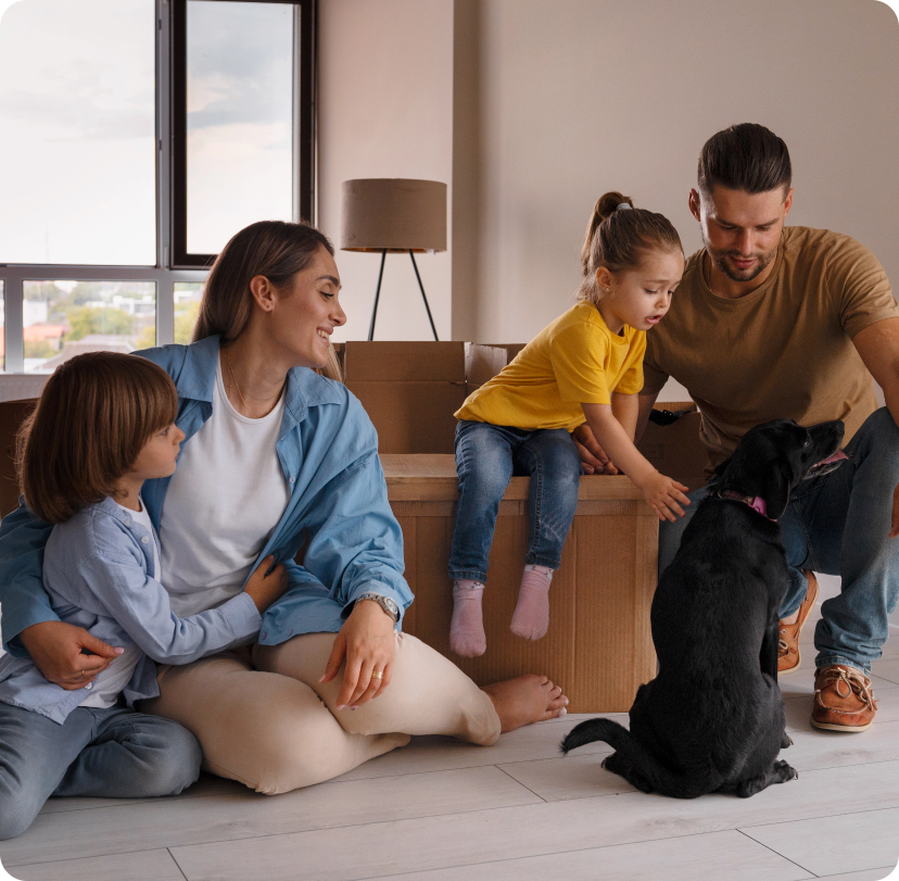 happy family with dog moving new home
